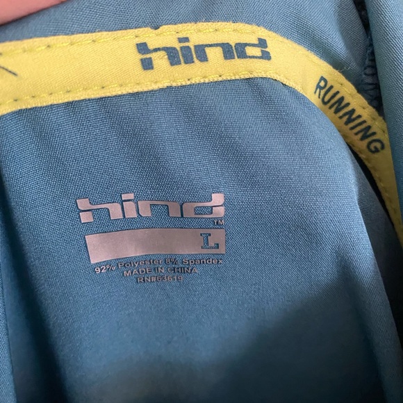 Turquoise patterned lightweight windbreaker with yellow zipper and pulls. - Picture 4 of 6